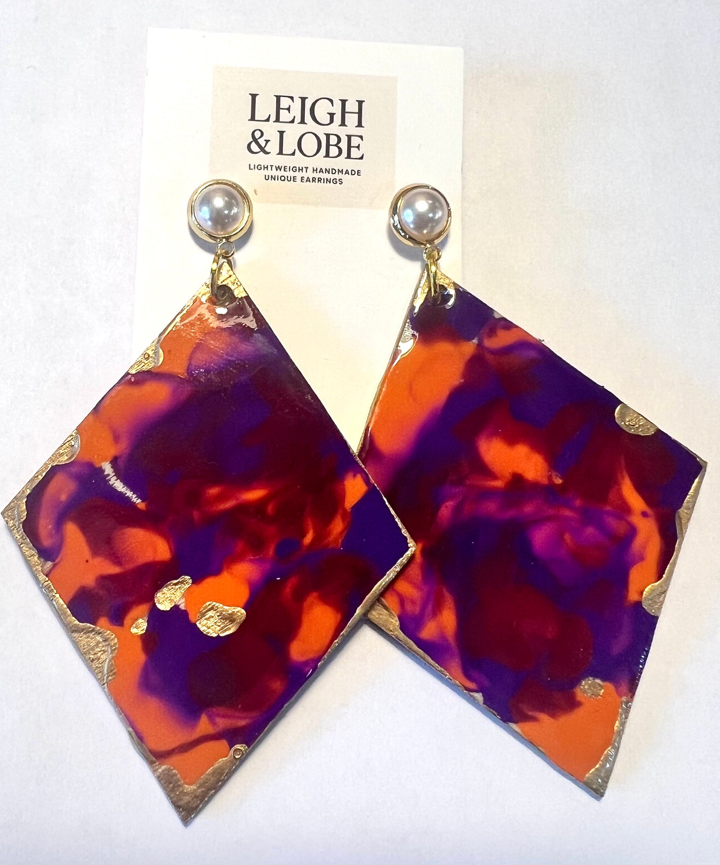 Clemson inspired fluid art with pearl stud.